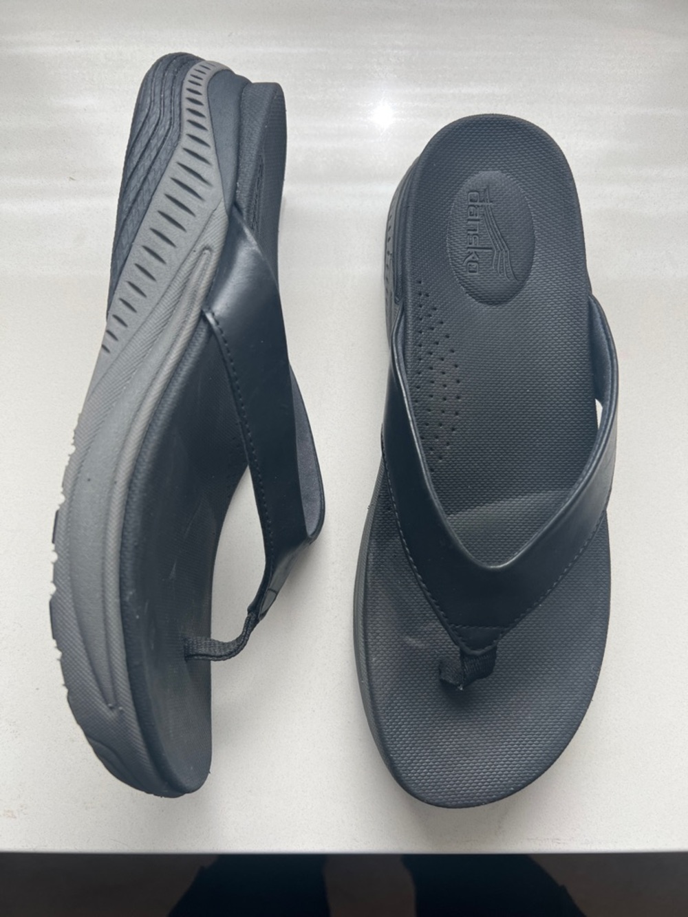 Dansko Black Slip-On Thong Sandals